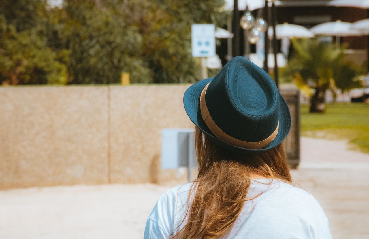 Fedora on woman's head